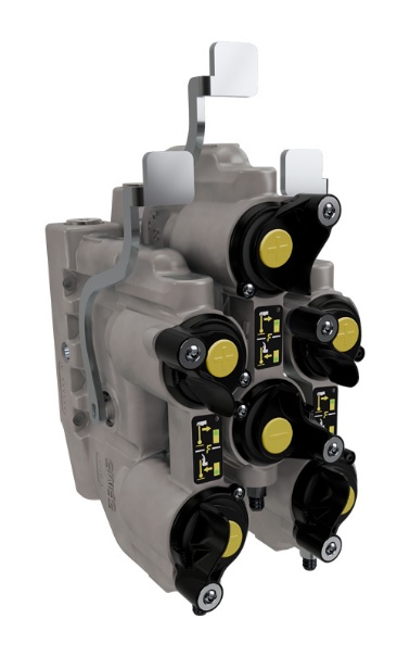 Faster GenYus cast manifolds with black and yellow hydraulic couplers mounted directly on a rear SCV valve stack.